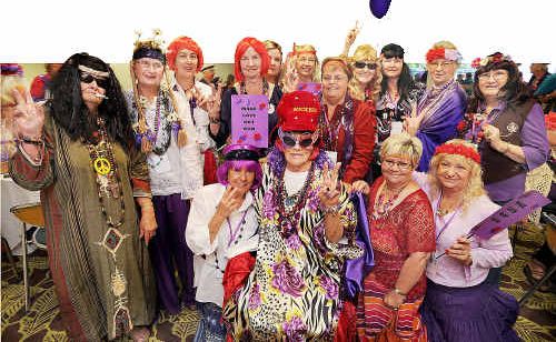 The Crimson Cuties from Hervey Bay with Queen Betty Duncan. The Crimson Cuties from Hervey Bay with Queen Betty Duncan.